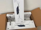 a cardboard box with a coat hanger on top of it