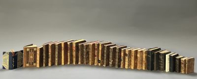 a row of books that are stacked on top of each other