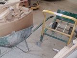 a wheelbarrow that is being built in a garage
