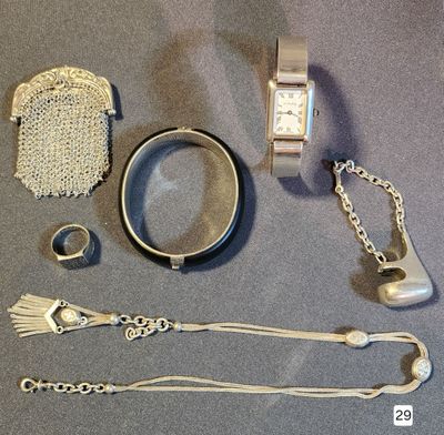 a lot of silver items that are on the table