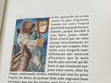 an open book with a picture of a man and a woman on it