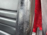 a seat belt attached to the back of a car