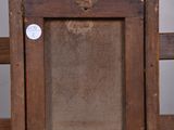 an old wooden picture frame on a wooden shelf