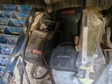 an image of a drill and other tools sitting on a table