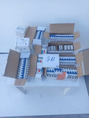 boxes of electrical equipment are stacked on top of each other
