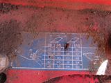 a close up of a piece of blue paper on the ground