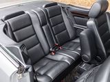 a black leather seat in the back of a car