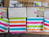 boxes of assorted items are stacked on top of each other