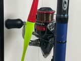 a fishing rod and a fishing pole on the wall