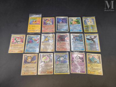a lot of pokemon cards that are on the table
