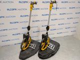 two scooters that are sitting on the floor