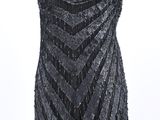 a black and silver dress on a mannequin mannequin mannequin mannequin mannequin mannequin mannequin mannequin mann