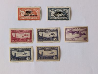 several different types of stamps are displayed on a white surface