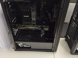 two computers that are sitting on top of each other