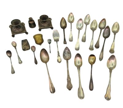 a lot of silver spoons and spoon spoons on the table