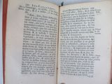 an open book that is sitting on a table