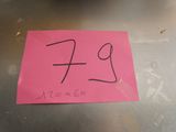 a pink piece of paper that has the number twenty on it