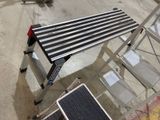 an image of a step ladder with a table on it