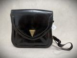 vintage black leather handbag with brass plated handle and shoulder strap