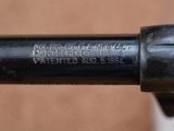 a close up of a gun that is on a table