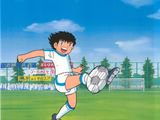 dessin représentant un garçon en train de frapper un ballon de foot sur un terrain de foot