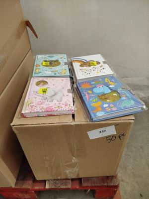 a lot of children ' s books in a box on a pallet