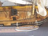 a model of a ship on display in a museum