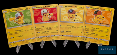 Plusieurs cartes Pokémon sont alignées les unes à côté des autres sur un fond noir.