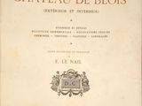 an old book with a picture of a building in the background