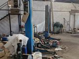 a garage with a lot of tools and tools on the floor