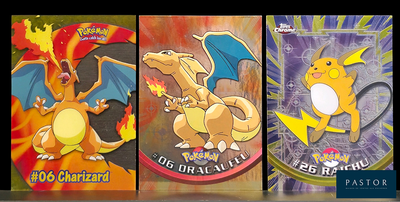 four different pokemon cards are displayed on a shelf in a store