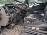 an image of a truck that has been vandalized and is in the process of being repaired