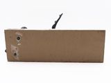 a close up of a cardboard box on a white surface