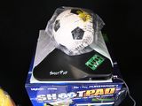 a white soccer ball sitting on top of a box