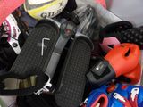 a bag full of shoes and other sports equipment