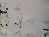 a baby blanket with a picture of a tractor and farm animals on it