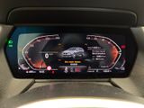 the dashboard of a car with a digital display on it ' s dashboard