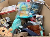 a cardboard box full of toys for sale in a store