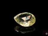 an image of a yellow diamond on a black surface
