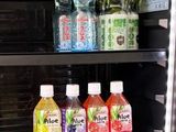 a refrigerator filled with lots of different types of drinks