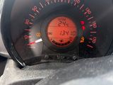 a close up of a car dashboard with a speedometer