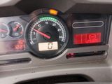 a close up of a car dashboard with a speedometer