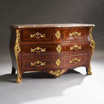 an image of a chest of drawers with a marble top