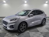 a silver 2020 ford escape is parked on a checkered floor