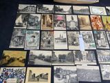 a lot of old postcards that are on the table