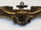 an image of a military badge with a bird on it