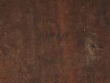 a close up of a piece of wood with a hole in it