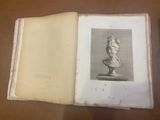 a book with a picture of a bust on it