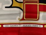 a red and yellow scarf with a picture of a fire hydrant on it