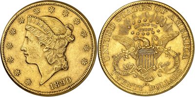a gold coin with a woman ' s head and eagle on it